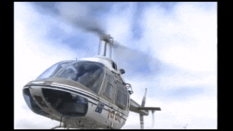 a helicopter with the letters td on the side