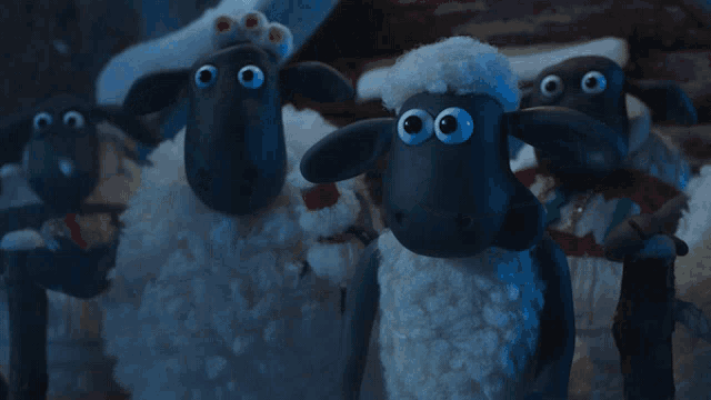 a group of cartoon sheep are standing together in a dark room