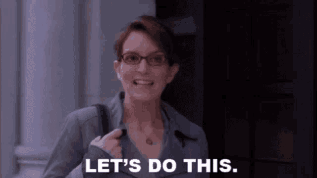 a woman wearing glasses is holding a purse and saying `` let 's do this . ''