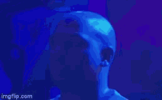 a close up of a man 's face with the website imgflip.com visible in the lower right corner