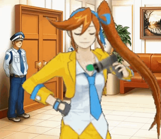 a woman in a yellow jacket and blue tie is holding a microphone in front of a man in a blue hat