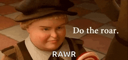 a cartoon character from shrek is holding a lollipop and says `` do the roar . rawr '' .