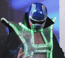 a man is wearing a blue helmet and a green costume