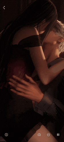 a man and a woman kissing in a video game