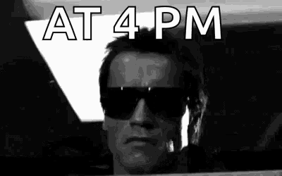 a black and white photo of a man wearing sunglasses and a sign that says `` at 4 pm '' .