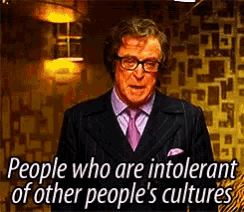 a man in a suit and tie with the words people who are intolerant of other people 's cultures below him