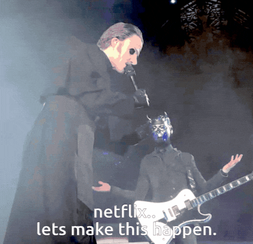 a man singing into a microphone next to a man playing a guitar with the words netflix lets make this happen below him