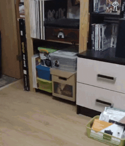 a shelf with a box that says ac/dc on top of it