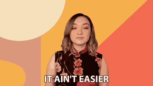 a woman says it ain 't easier in front of a colorful background