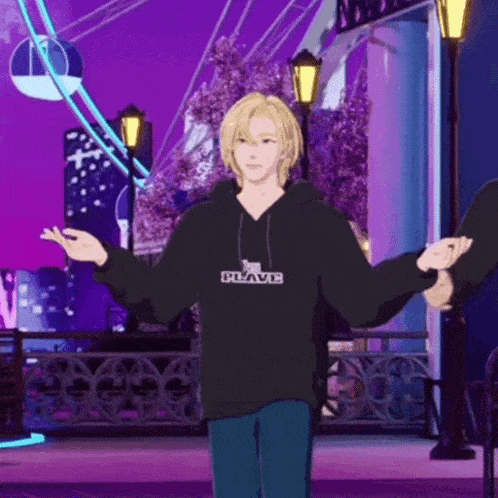 a man in a black hoodie is standing in front of a ferris wheel and has his arms outstretched .