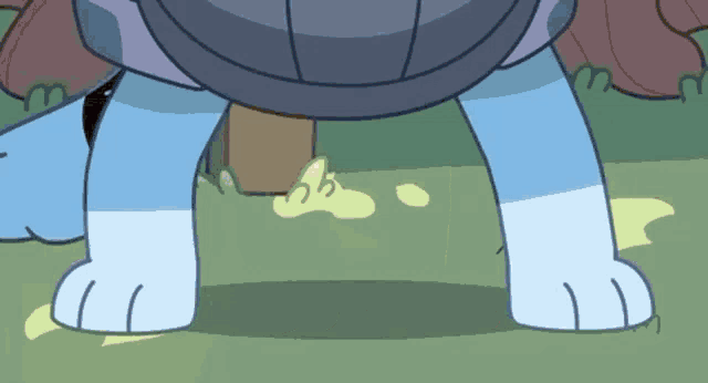 a cartoon turtle 's feet are shown in a close up of a cartoon turtle 's paws .