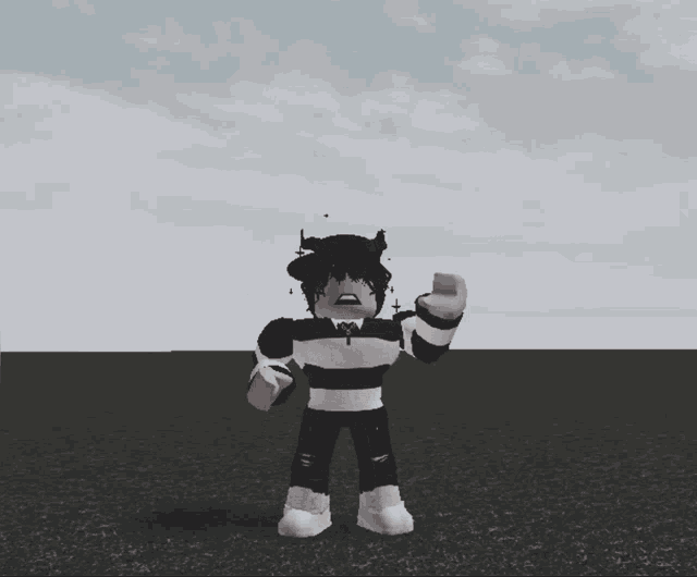 a cartoon character in a black and white striped sweater