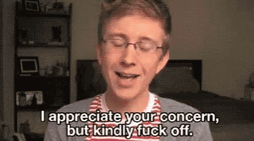 a young man wearing glasses is saying i appreciate your concern but kindly fuck off .