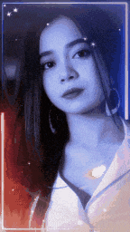 a close up of a woman 's face with a blue and red background .