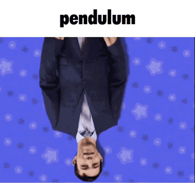 a man in a suit and tie is upside down in front of a blue background with the word pendulum on it
