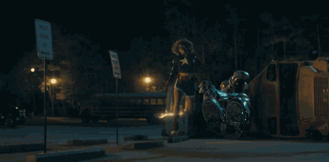 a woman in a superhero costume leans against a motorcycle in a parking lot