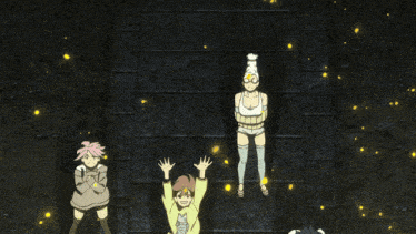 a girl wearing a yellow shirt with a fish on it stands with her hands in the air