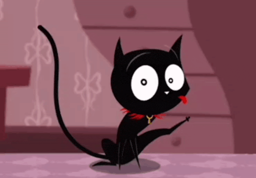 a black cat with a red tongue sticking out is wearing a collar with the letter y on it