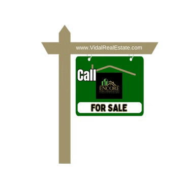 a real estate sign says call encore for sale