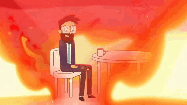 a man with a beard is sitting in front of a table with a cup of coffee