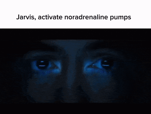 a close up of a man 's face with the words jarvis activate noradrenaline pumps below him