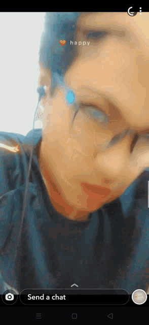 a screenshot of a person 's face with the words send a chat visible