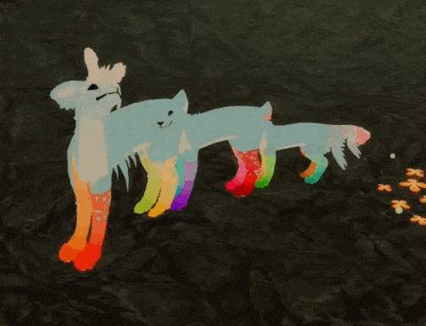 a drawing of a rainbow colored animal on a black surface