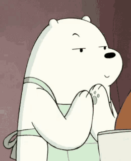 a cartoon polar bear wearing an apron is making a face