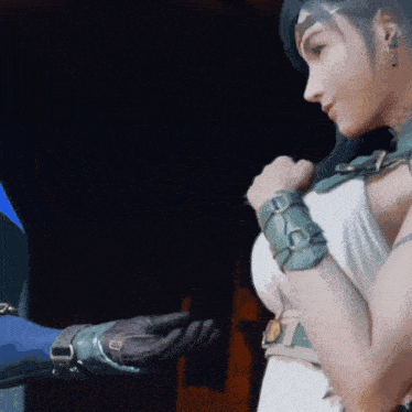 a woman in a white dress holds a man 's hand in a video game