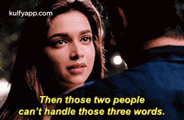 a woman is looking at a man with the words then those two people can 't handle those three words