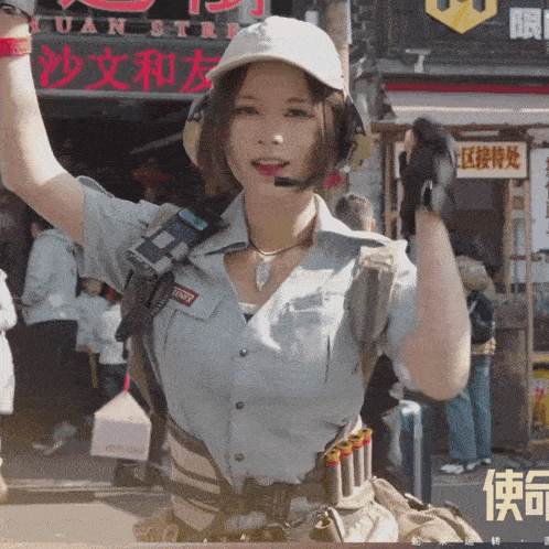 a woman stands in front of a store that says yuan street on it