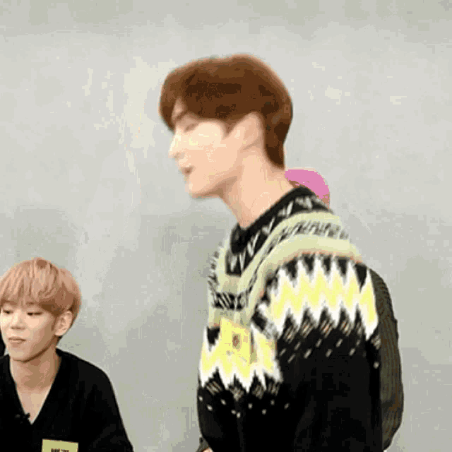 a man with a name tag that says ' nct ' on it