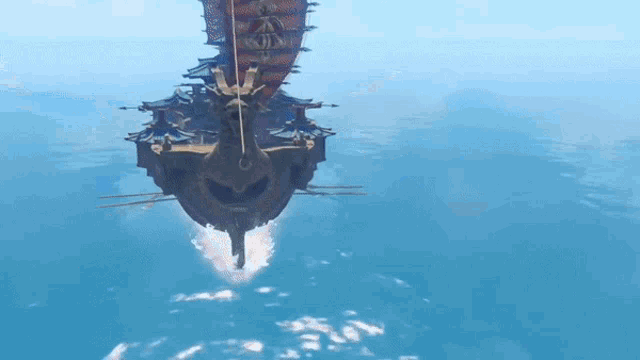 a large ship is floating on top of a large body of water