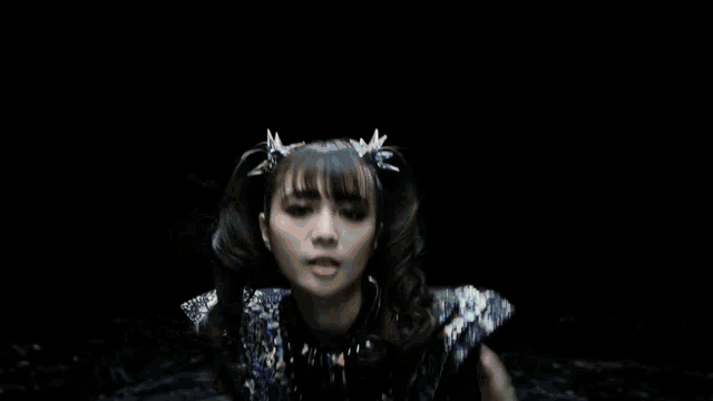 a blurry picture of a person 's face with a skull and crossbones
