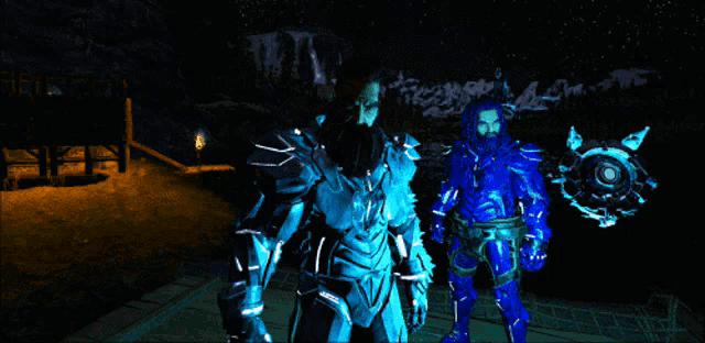 a man in a blue suit is standing next to another man