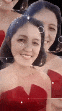 a woman in a red dress is smiling with bubbles around her face