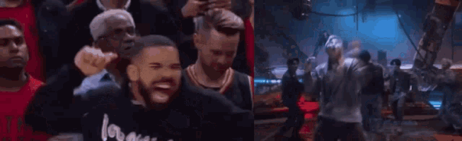 a man in a toronto raptors jersey is laughing in the crowd .