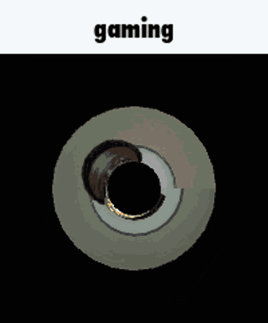 a circle with a man 's face in it and the word gaming below it
