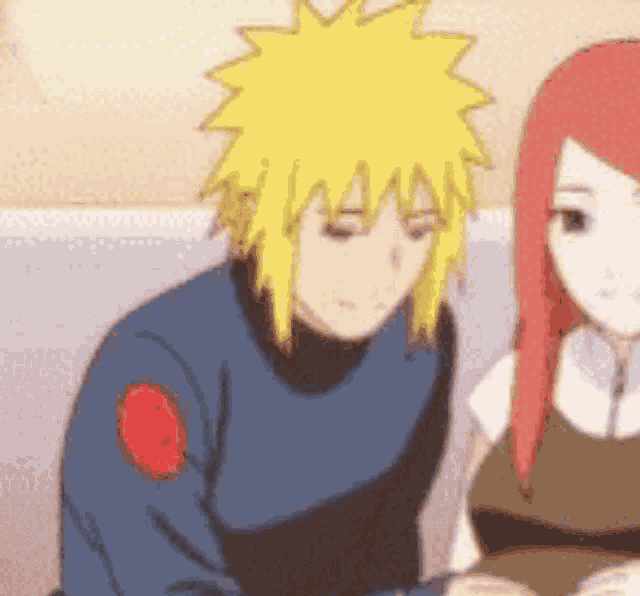 a man with yellow hair and a woman with red hair are sitting next to each other in a room .