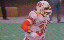 a football player wearing a helmet that says asu