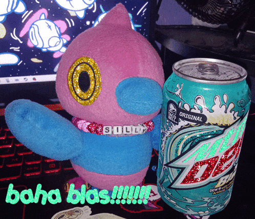 a can of mtn dew next to a stuffed animal