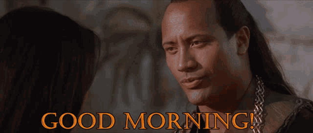 a man and woman are looking at each other with the words good morning written above them