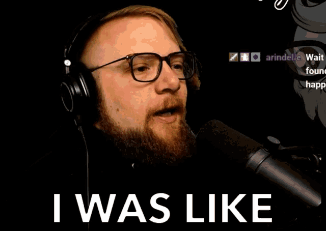 a man wearing headphones and glasses is talking into a microphone and says i was like