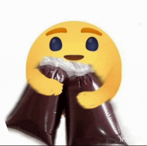 a yellow smiley face is holding two plastic bags of juice .
