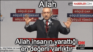 a man in a suit and tie stands in front of a microphone with his hands in the air and says allah