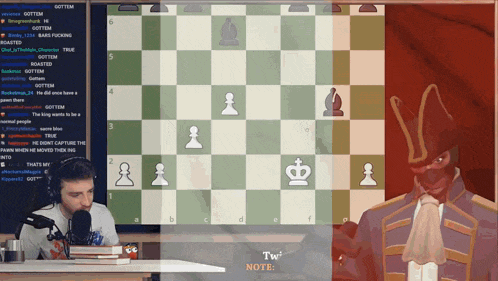 a man is playing a game of chess on a computer screen with the words tw note below him