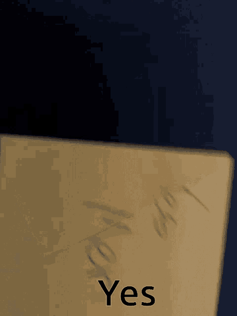 a piece of paper that says " yes " on it
