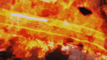 a close up of a fire with a white line
