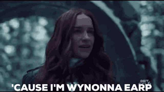 a woman with red hair says ' cause i 'm wynonna earp '