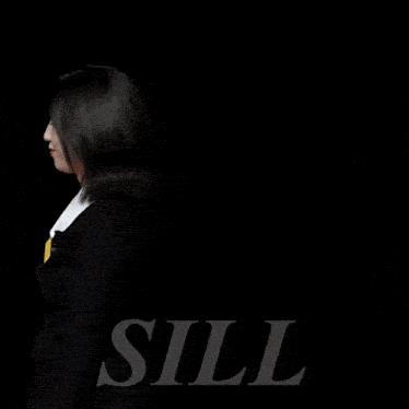 a woman is touching another woman 's hair in front of a black background with the letters ll on it